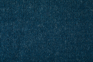 Sweater texture background. Blue knitted texture abstract background