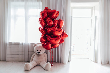 red balloons shaped heart valentine's day toy in the room