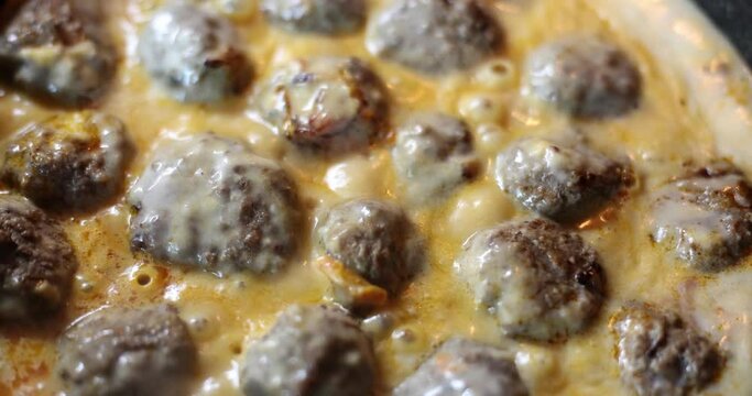 Swedish meatballs are prepared in sauce, close-up