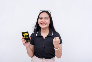 A woman is elated after receiving a VIP pass ticket or badge. Showing her lanyard. Isolated on a white background. - obrazy, fototapety, plakaty