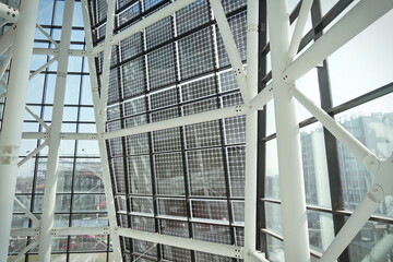 facade of solar panels seen from inside the modern building