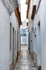 Fototapeta na wymiar Scenic view of alley in Armacao de Pera