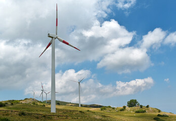 Wind turbines on a plain, natural high ground in Sicily, Italy