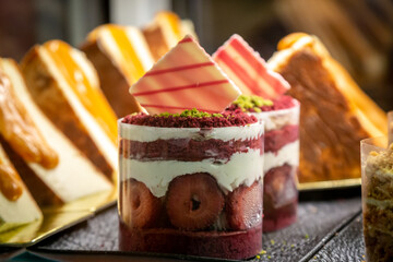 Desserts and cakes for sale, with a shallow depth of field
