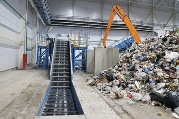 conveyors in the workshop of a waste sorting plant