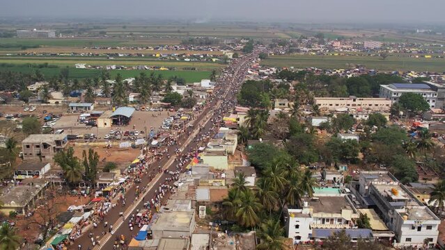 Huge crowd moving on busy roads during religious annual festival
