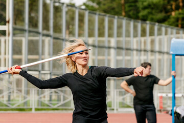 women athlete thrower javelin throw in athletics