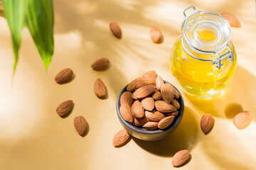 Almond oil and seeds (Prunus dulcis) close-up image