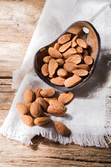 pile of natural almonds (Prunus dulcis) close-up image