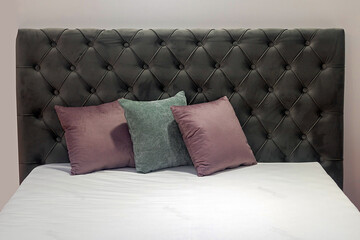 Decorative pillows inside bed