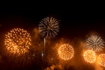 Fototapeta premium The firework isolated display for celebration happy new year and merry christmas on black isolated background in Brazil