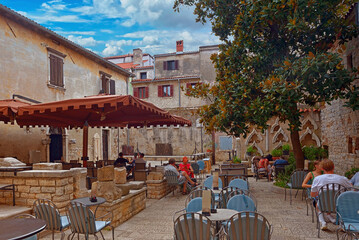 Medieval Croatian old street,with street cafe in Croatia, Istria - 572725768