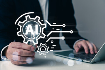 AI (Artificial intelligence) concept, cloud computing, businessman hold light bulb and touching AI infographic, gear cogs icons, creative idea, AI technology, quantum computing, automation.