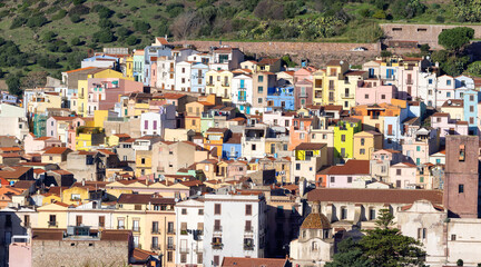Obraz premium Homes and Apartments in Touristic Town. Bosa, Sardinia, Italy. Sunny Fall Season Day.