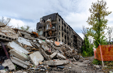 destroyed and burned houses in the city Russia Ukraine war