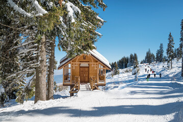 Wooden chapel  in the winter mountain . Vitosha mountain ,Bulgaria 