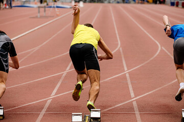 start runners sprinters 100 meters race track and field competition