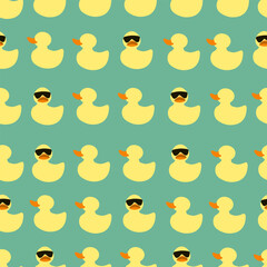 Yellow ducks and ducks with glasses on a blue background. Seamless vector pattern for textiles, design, packaging, print