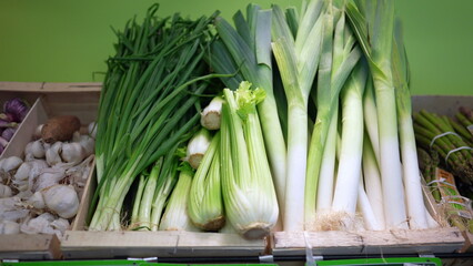 Raw Vegetables Celery on display at grocery store in organic local market. Nutritious food