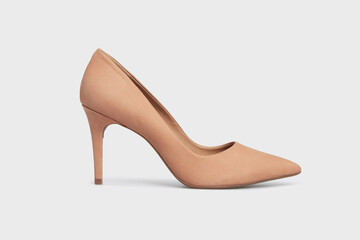 Beige pointy toe women's shoe with high heels isolated on white background. Female classic stiletto...