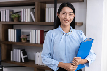 Portrait Asian lady secretary. Office employee businee woman worker happy smile.