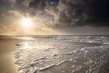 beautiful sunset over sand north sea beach