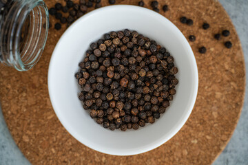 Black Pepper in a white Bowl