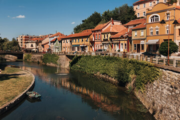 Fototapeta na wymiar Knjazevac Old Town and Embankment with Bridge and Sailboat