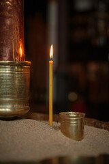 Orthodox Church. Christianity. Interior decoration with burning candles and icons in traditional Orthodox Church. Religion faith pray symbol