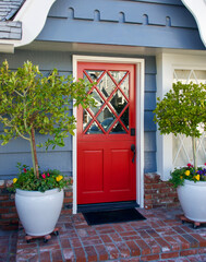 classic beach cottage with bright red front door