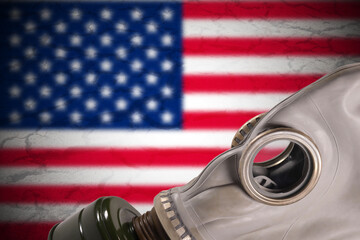 Gas mask on the background of the flag of USA, air pollution concept, radiation waste, nuclear...