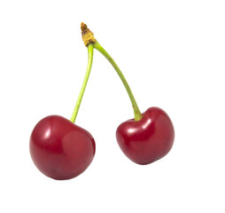 Two isolated red cherries on a white background.