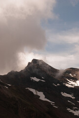 Cloudy weather in mountains in Alps