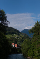 Fototapeta na wymiar View on village in mountains in Alps