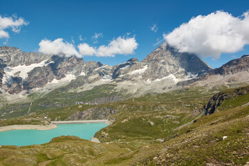 Fototapeta na wymiar The Matterhorn peak and Lake Goillet in Aosta Valley, Italy