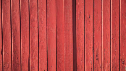 Fototapeta premium Puerta de tablones de madera pintada de rojo