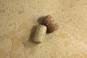 Wine corks isolated on brown background close-up