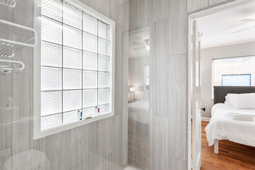 modern interior of a white apartment with open floor layout long term rental loft