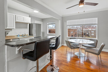 modern interior of a white apartment with open floor layout long term rental loft