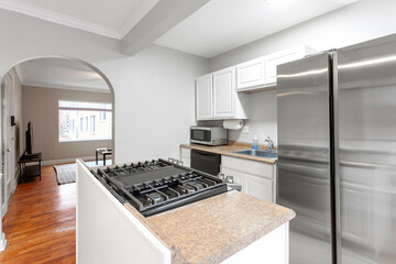 modern interior of a white apartment with open floor layout long term rental loft