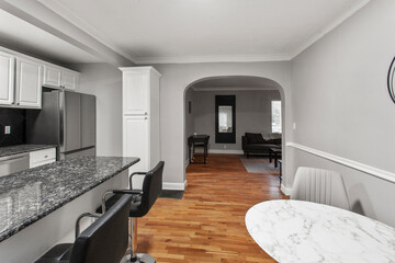 modern interior of a white apartment with open floor layout long term rental loft