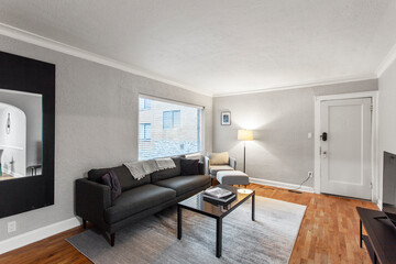 Fototapeta na wymiar modern interior of a white apartment with open floor layout long term rental loft