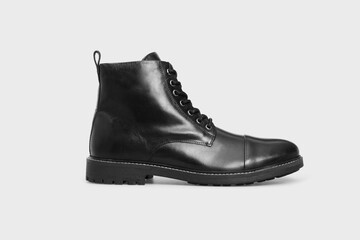 Black men's classic leather ankle boots isolated on white background. Pair of lace up business formal male polished shoes. Template, mock up