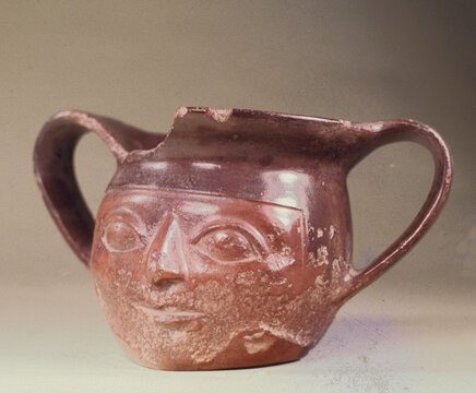 Pre-Columbian animal shaped ceramic called "Huaco" pottery from unidentified ancient Peruvian culture. Pre-Inca ceramic piece made by the ancient civilization.