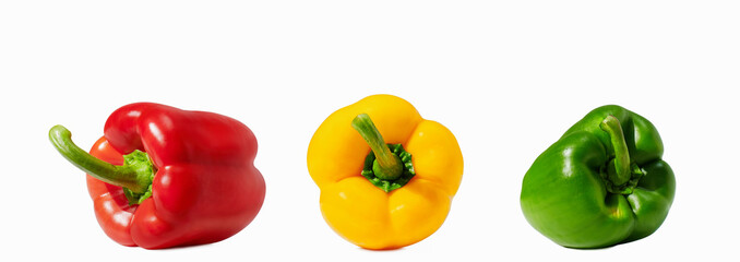 Yellow, red, green pepper on white background