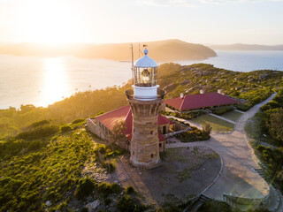 Hill top of Barrenjoey head of Sydney Pacific coast with the lighthouse overlooking palm beach on a...