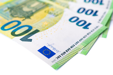 Detail of the European Union flag on the one hundred euro banknote. European currency close-up photograph. - 572788380