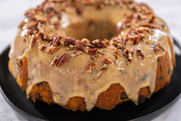 Chocolate pumpkin bundt cake with toffee glaze