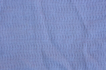 gray fabric texture from a piece of crumpled clothing 