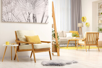 Spring atmosphere. Stylish room interior with cozy furniture in yellow and white colors